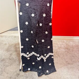 Alexis Chic Black Lace Pants with White Floral Design. Size Medium.